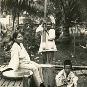 Malaysia Malay Boy Pounding Rice
