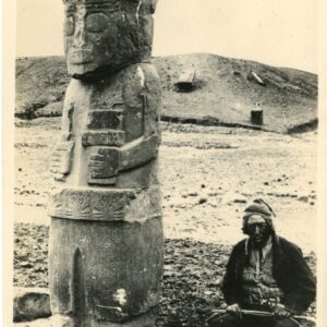 Peru Indigenous Man by the Inca Statue