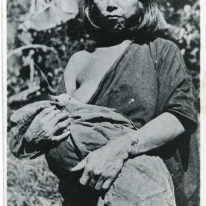 Peru Indigenous Woman Breastfeeding on Field