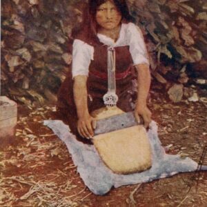 Chile Mapuche Girl Grinding Wheat