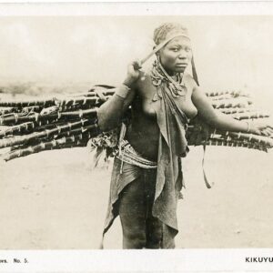 Kenya Kikuyu Woman carrying Bamboo
